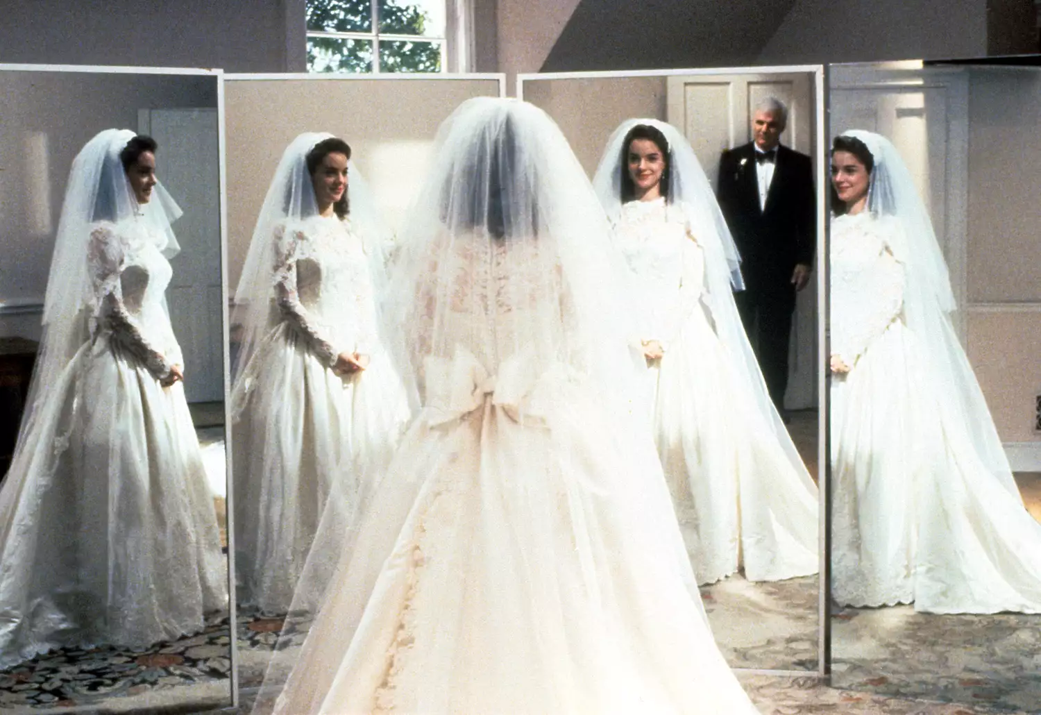 Kimberly Williams-Paisley tries out her wedding dress in front of Steve Martin in a scene from the film "Father Of The Bride"