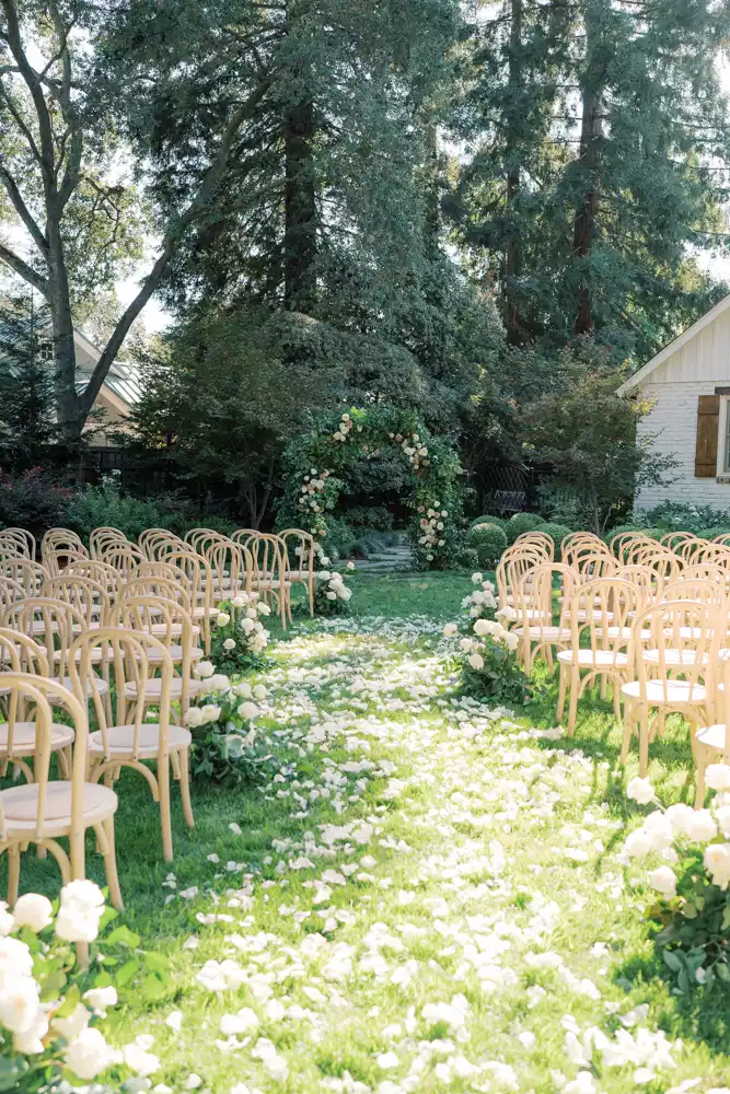 Outdoor Wedding Ceremony With Flower Petal-Lined Aisle