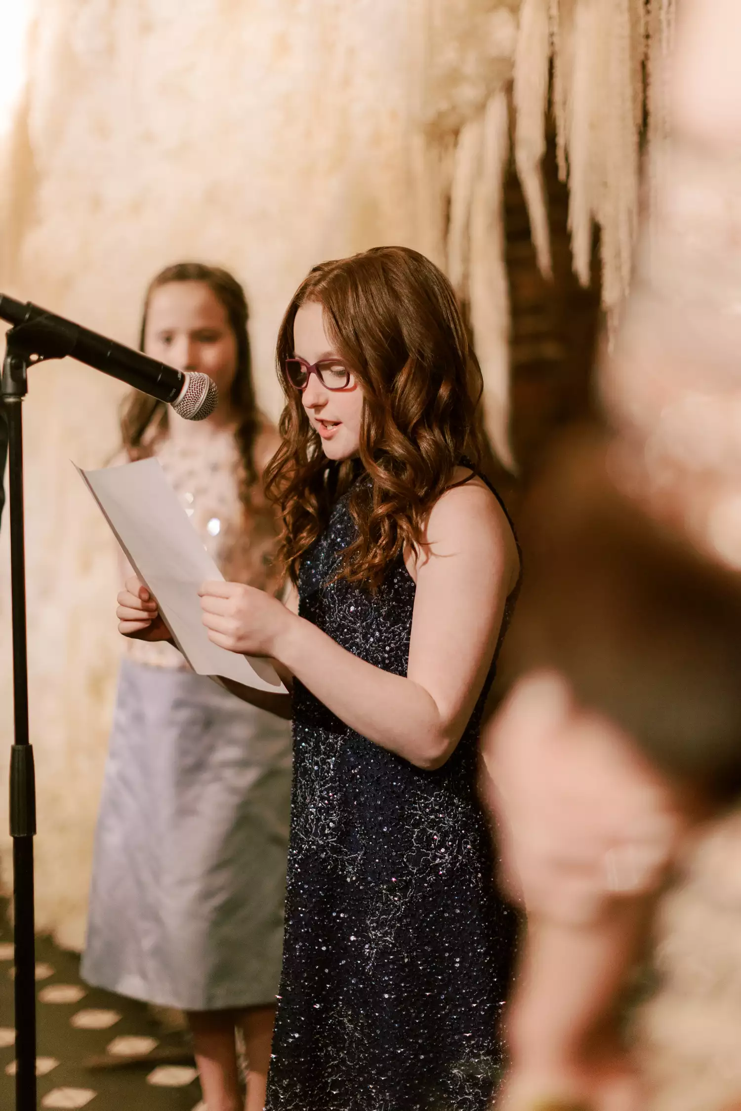 young girl performing a ceremony reading during wedding