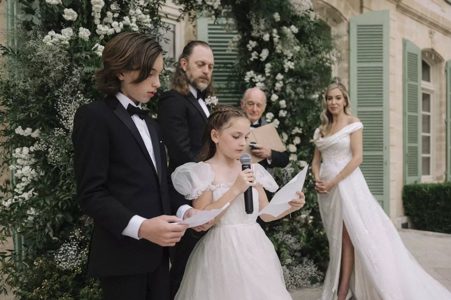 young children performing ceremony readings at wedding ceremony