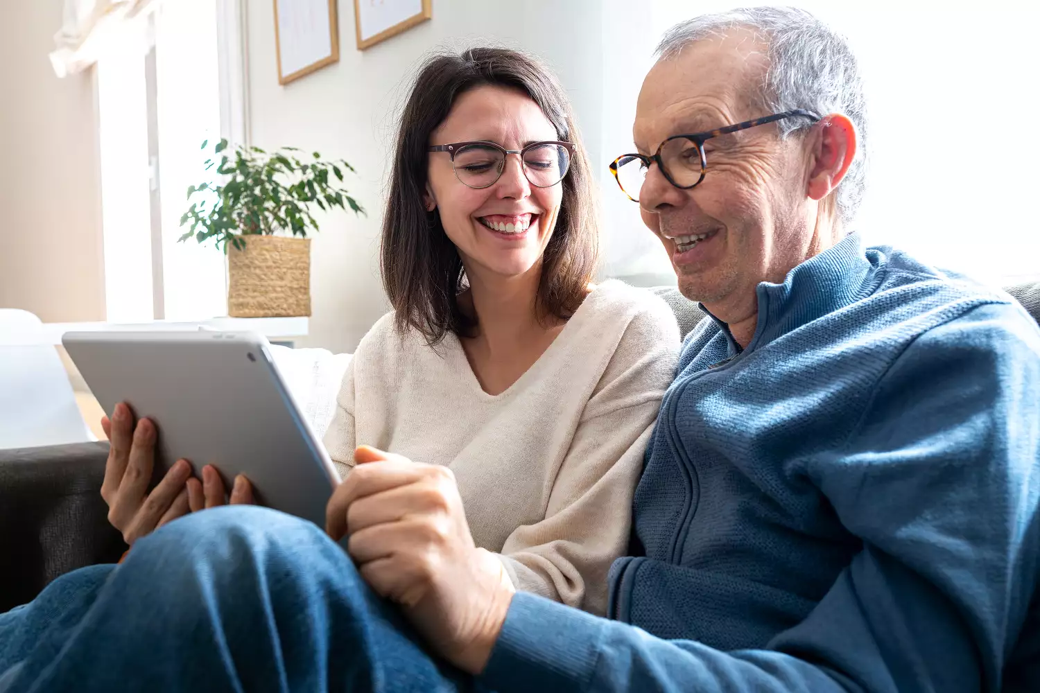 Adult Woman Planning Wedding With Her Father on Ipad