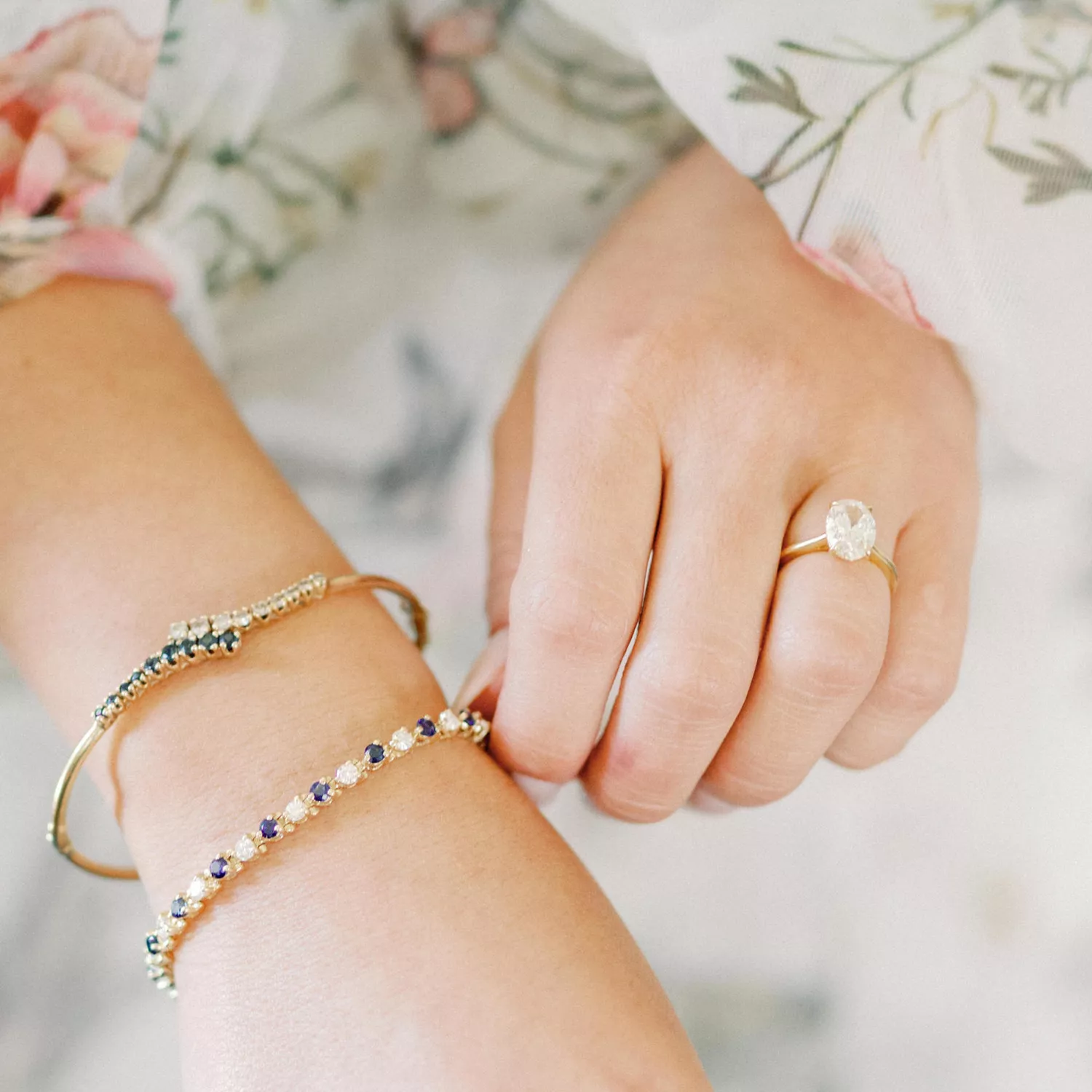 Woman Wearing Diamond Ring and Bracelets