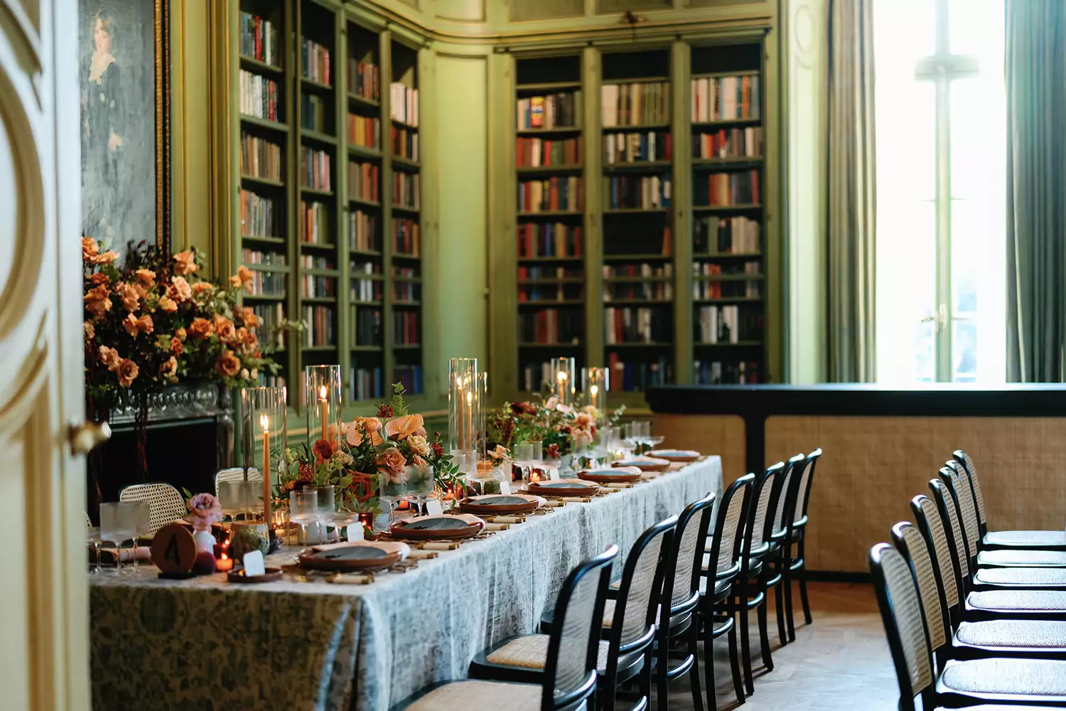 dinner table setting inside of a library