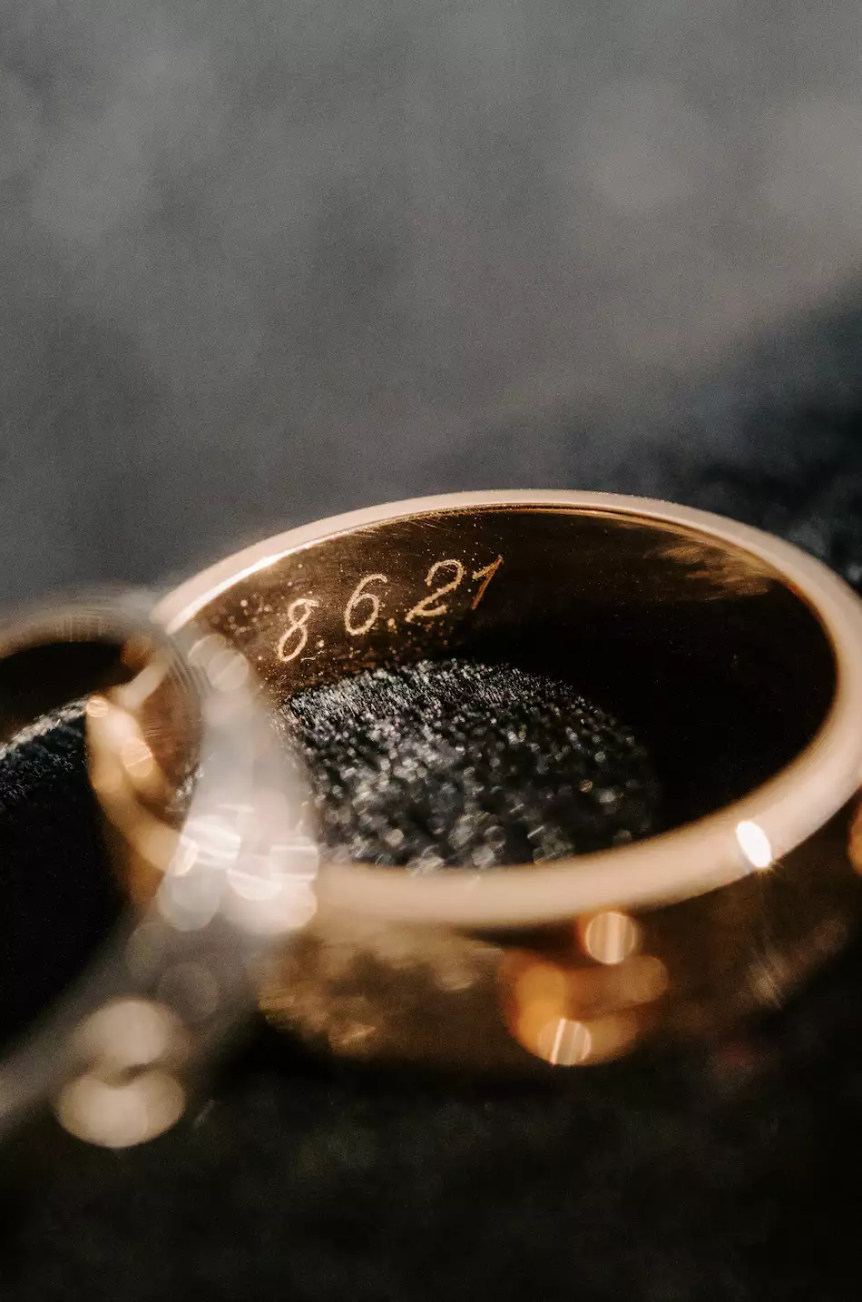 gold cartier wedding band engraved with wedding date