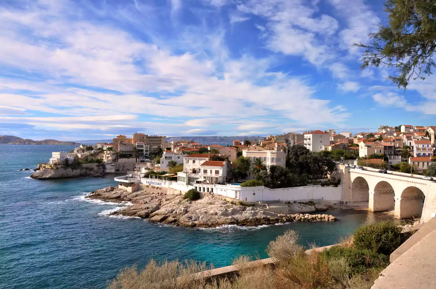 view of marseille, france's ocean, villas, and bridge