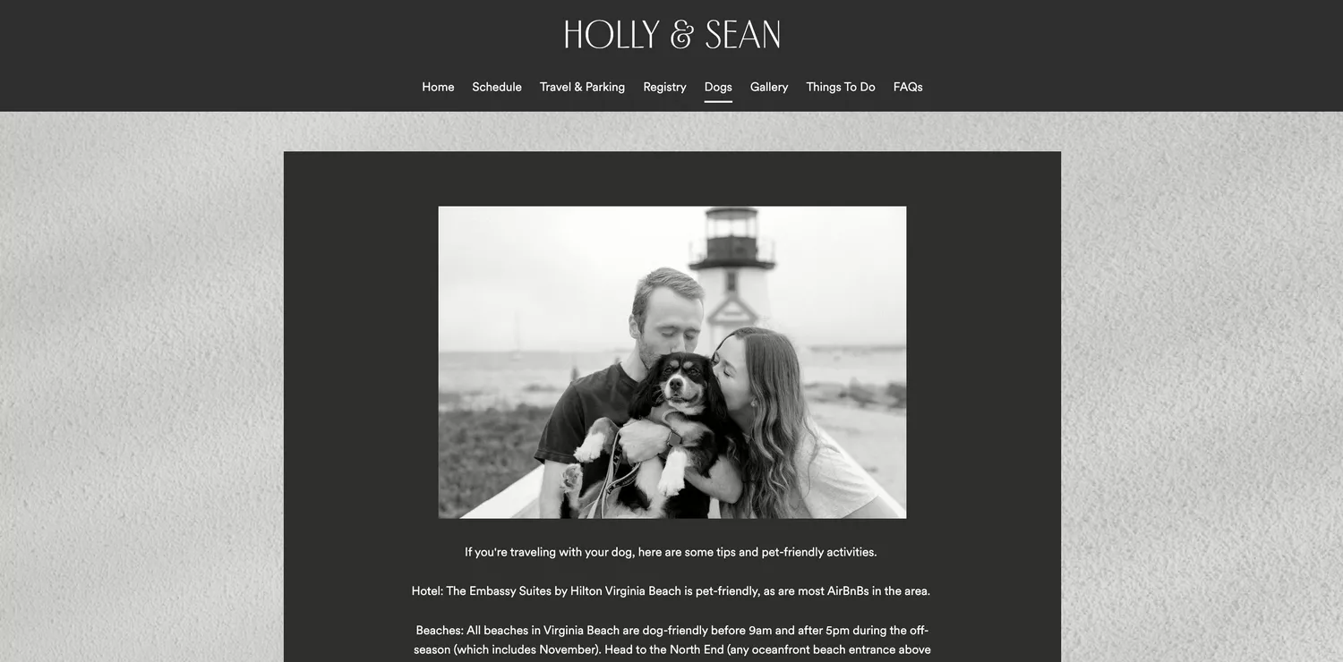 couple kissing their dog on their wedding website