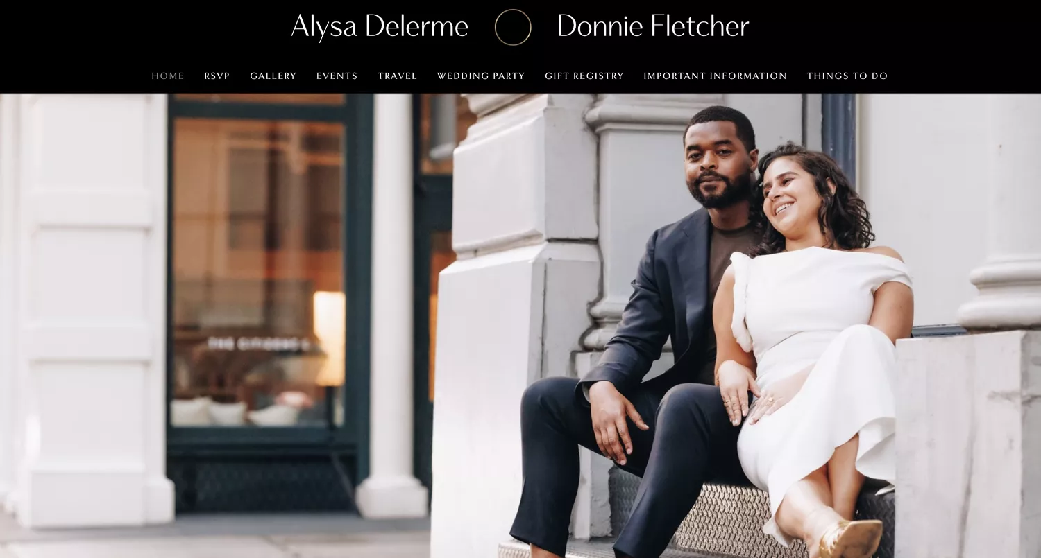 man and woman sitting on steps outside posing in formal attire