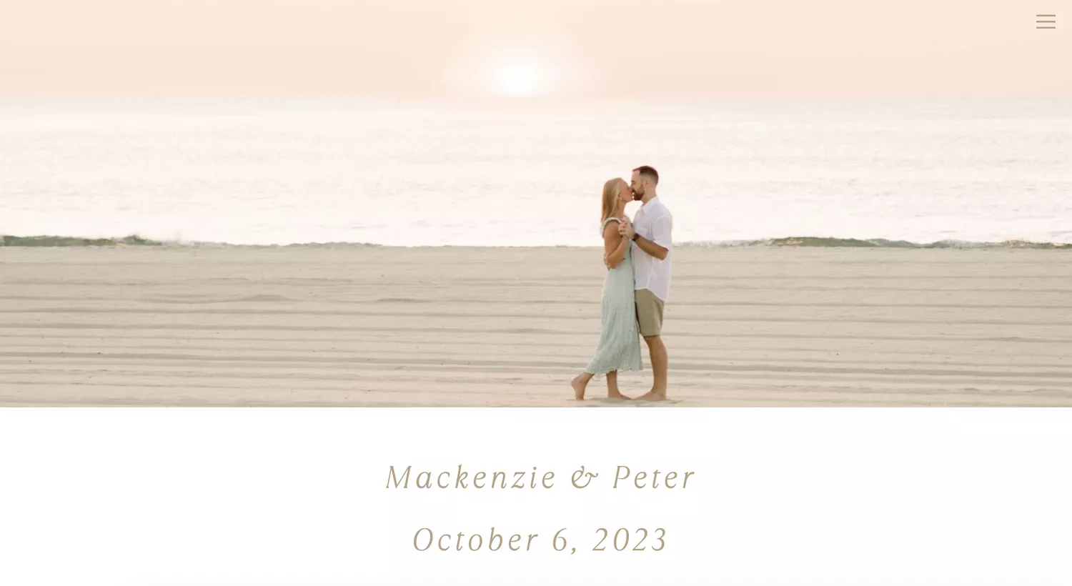 Wedding website homepage with photo of the couple kissing on the beach at sunset