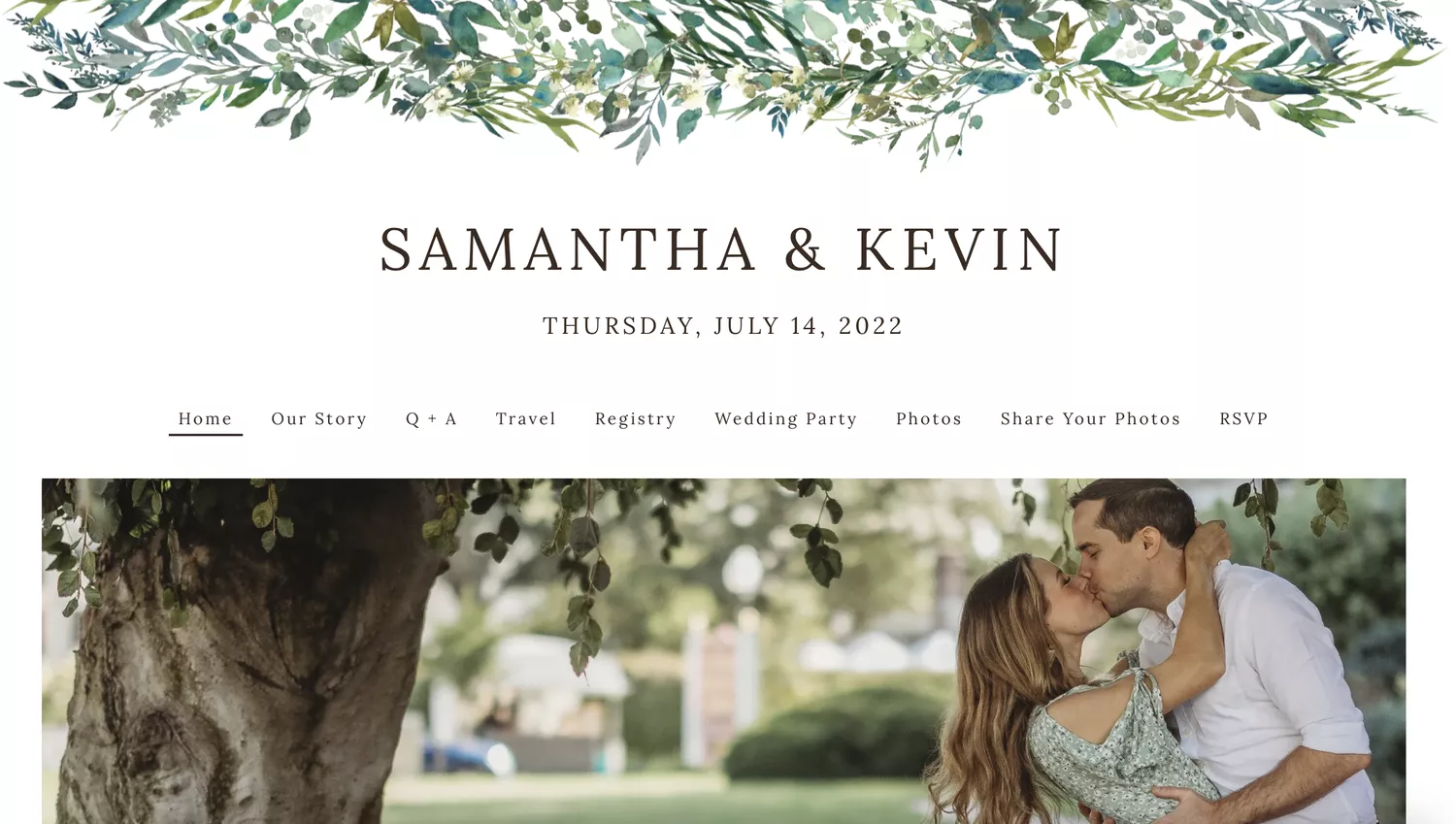 Wedding website homepage with illustration of greenery and portrait of the couple kissing