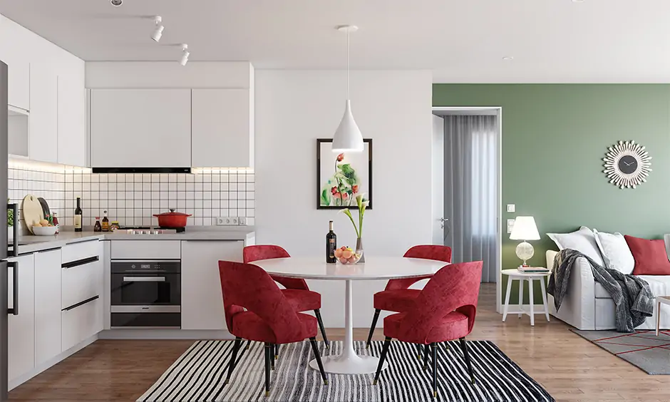 A sleek and stylish indian open kitchen with dining room and living room