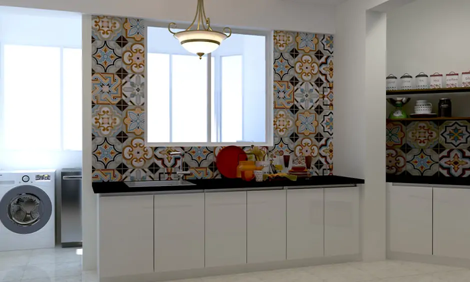 Moroccan tiles with a riot of colours manage to add funkiness to the all-white kitchen.