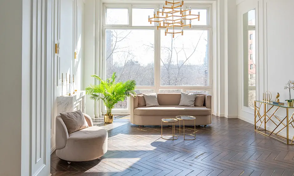 Art deco interior decor with brown chevron tiles and gold accents and lights