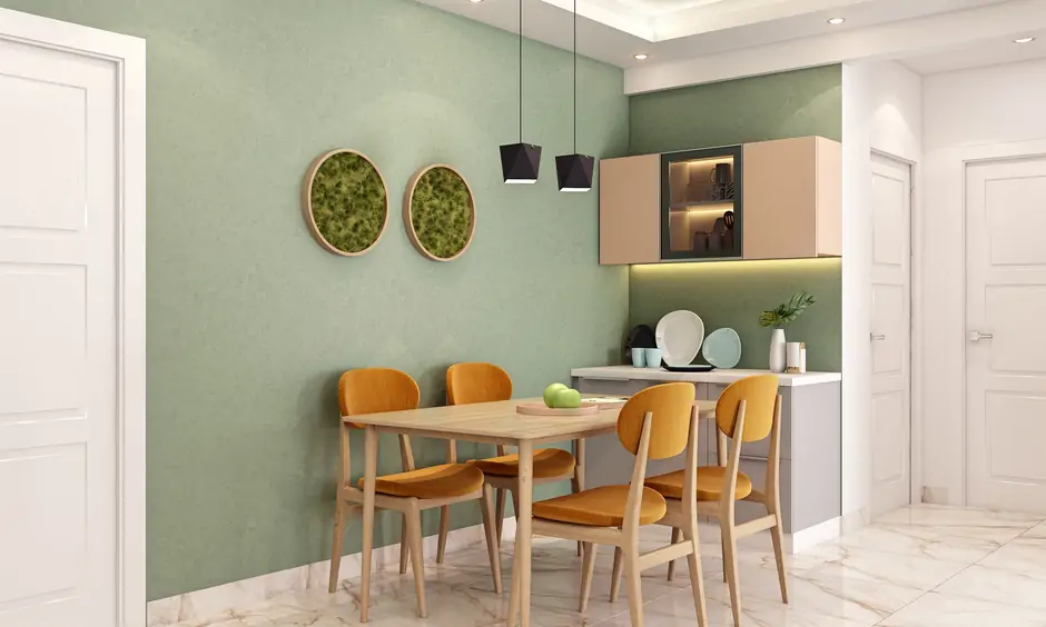 Dining room with two hanging round artificial grass wall designs