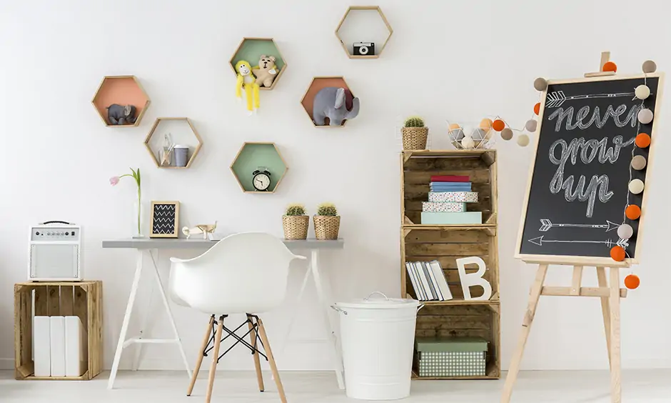Study table wall decorated with colourful wall shelves and wall-mounted storage makes the time enjoyable and lively.