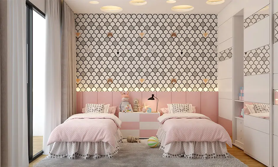 Cool kids bedroom colour in pink and white with vivid pattern lends vibrancy to space.