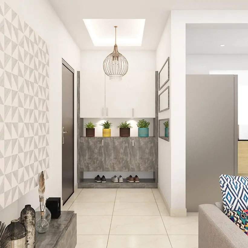 Entrance foyer area design with cupboard, wallpaper, decor, entryway furniture with storage and seating.