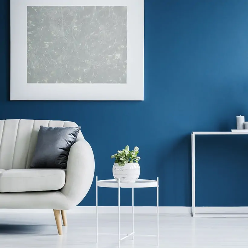 Home interior wall painting with a pantone classic blue wall lends a feeling of peace and calm