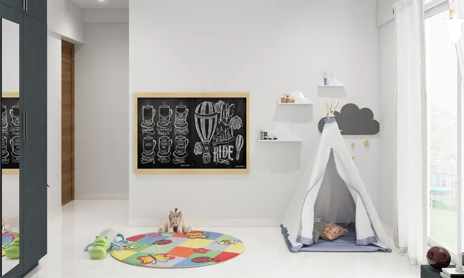 Kid’s room decor stickers, framed chalkboard and cloud-shaped shelves add a dreamy vibe