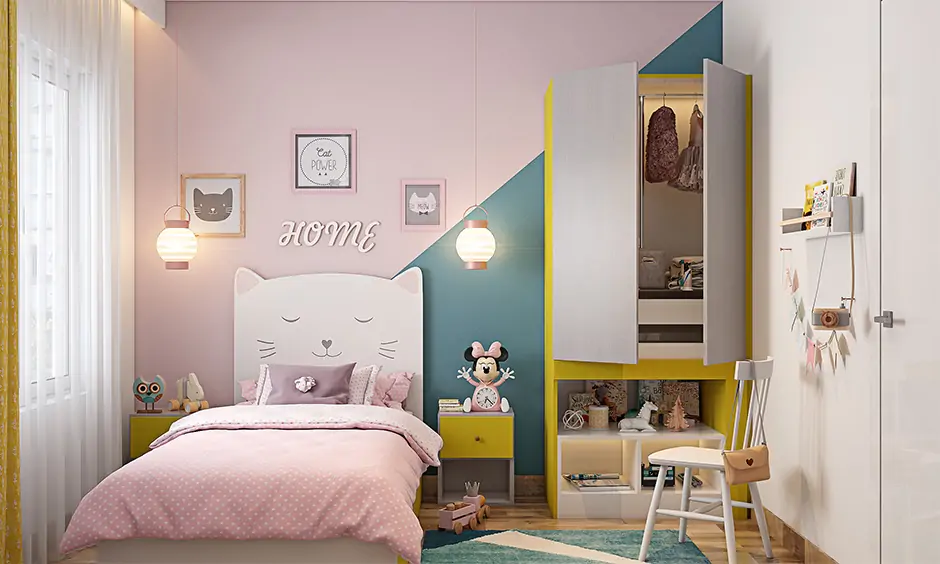 A kid's room features a wardrobe-attached pull-out desk and a white wooden kids chair