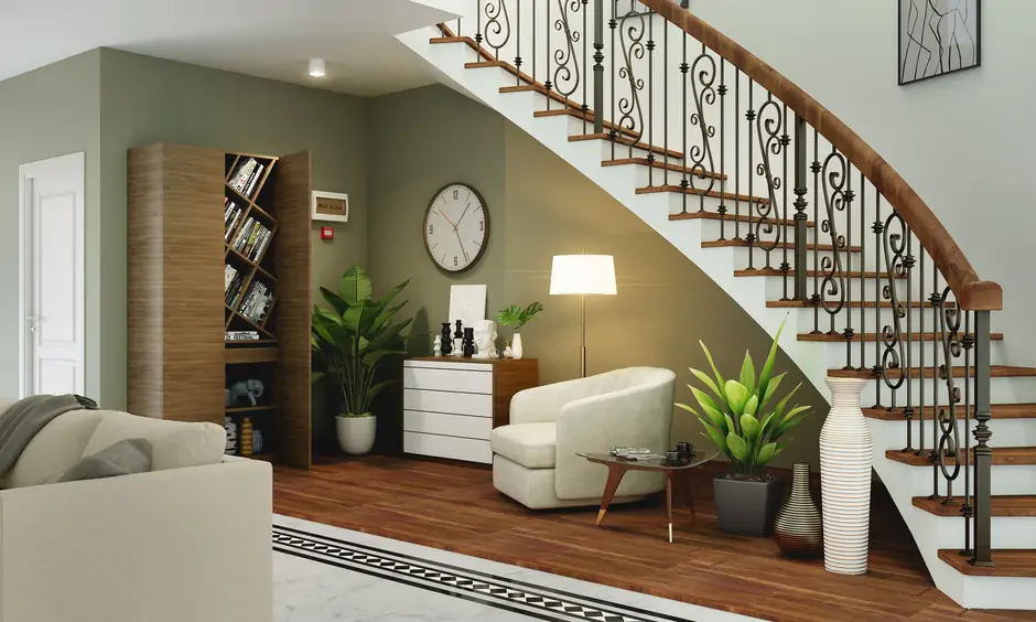 Single sofa chair is beneath the living room's staircase for reading