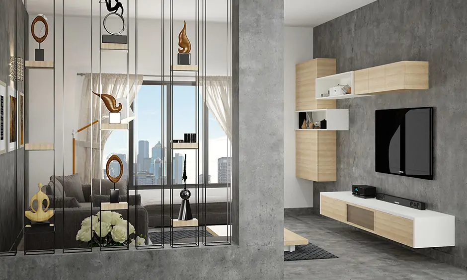 Modern living room partition ideas incorporate a metal divider enclosed in a cement frame for an industrial look