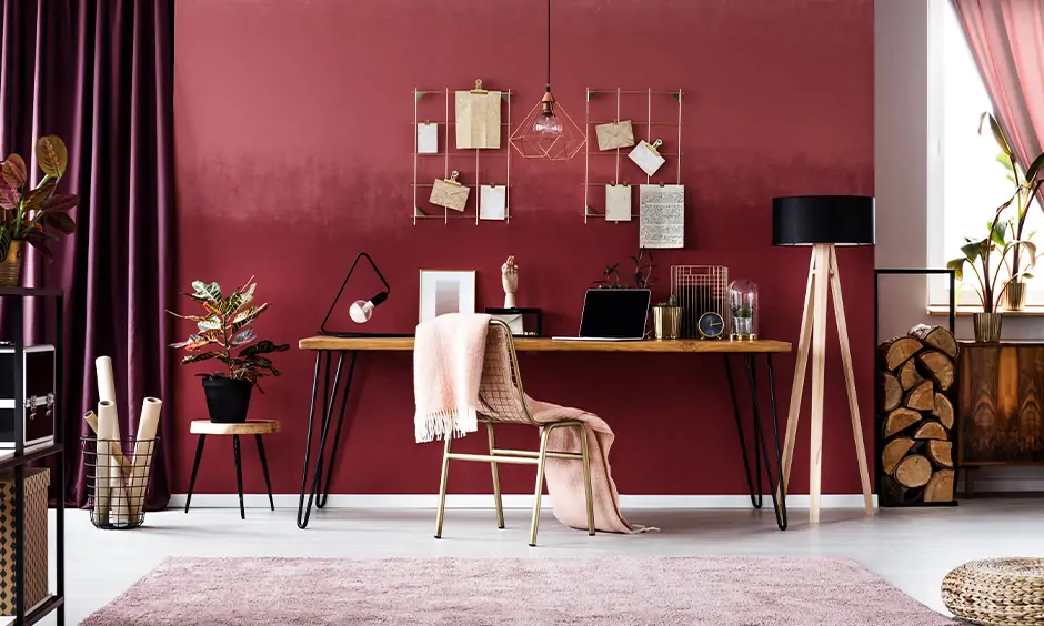 Study room, designed with a monochromatic red colour scheme, emanates warmth and cosiness