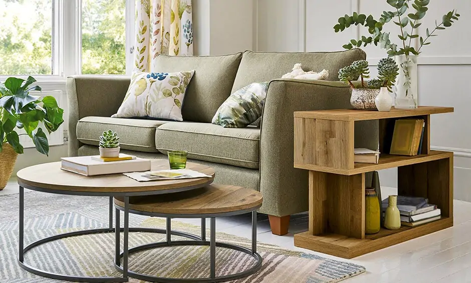 Decorative living room side table featuring small potted plants for a nature-inspired look