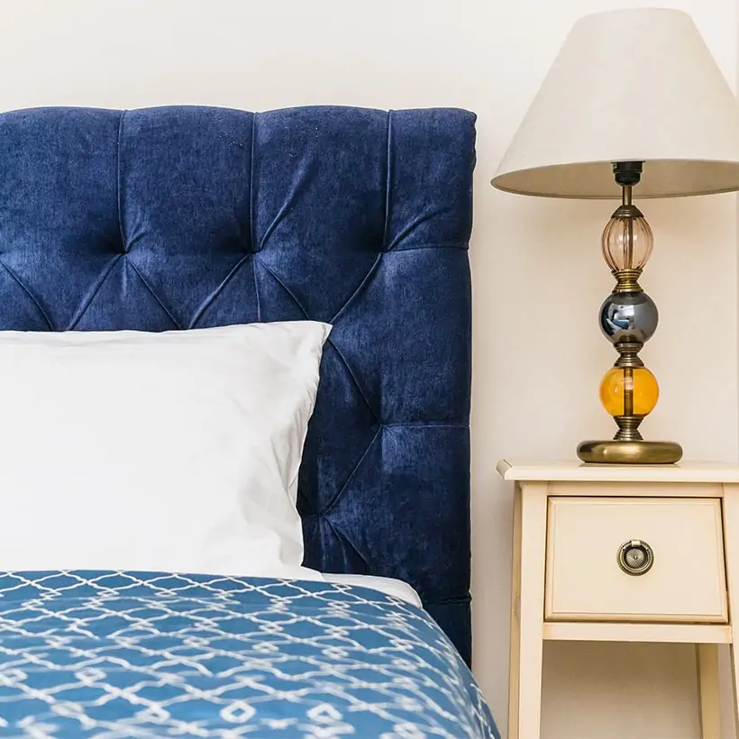 Revamp your bedroom with a pantone classic blue headboard, its looks royal