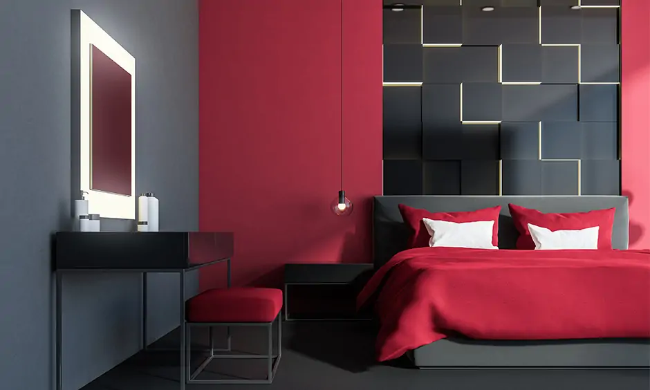 Red accent color goes with gray walls lending a unique interior style