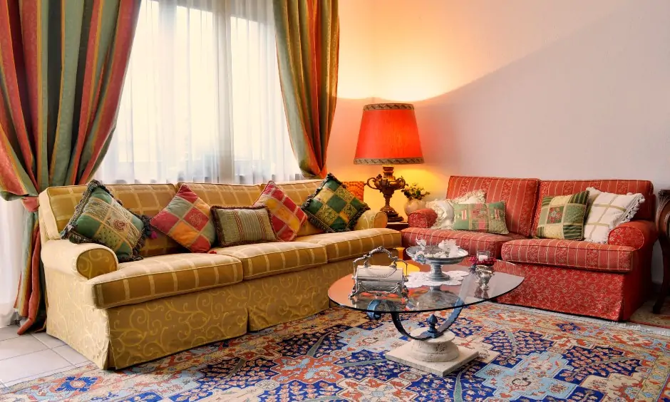 The colourful drapes add to the beautiful riot of colours in the area are the modern curtain designs for living room.