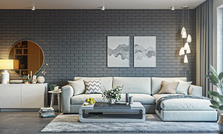 Sectional grey colour l shape sofa set for living room with armrest support along the longer side is perfect to lounge.