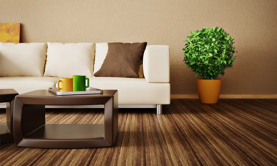 Shades of brown paint and white with brown hardwood flooring and the brown coffee table