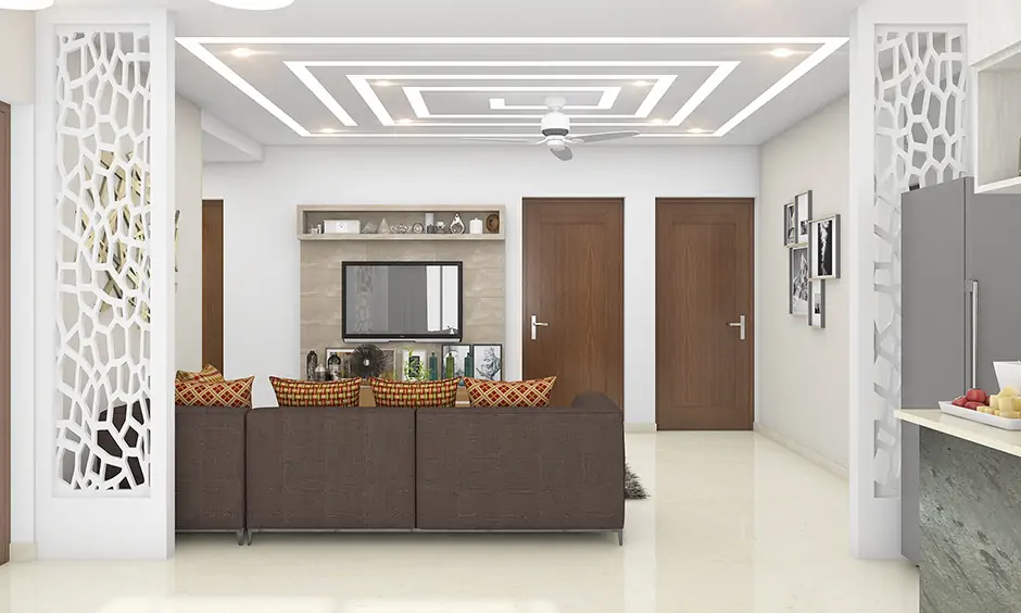 Simple false ceiling design for a rectangular hall with muted colours