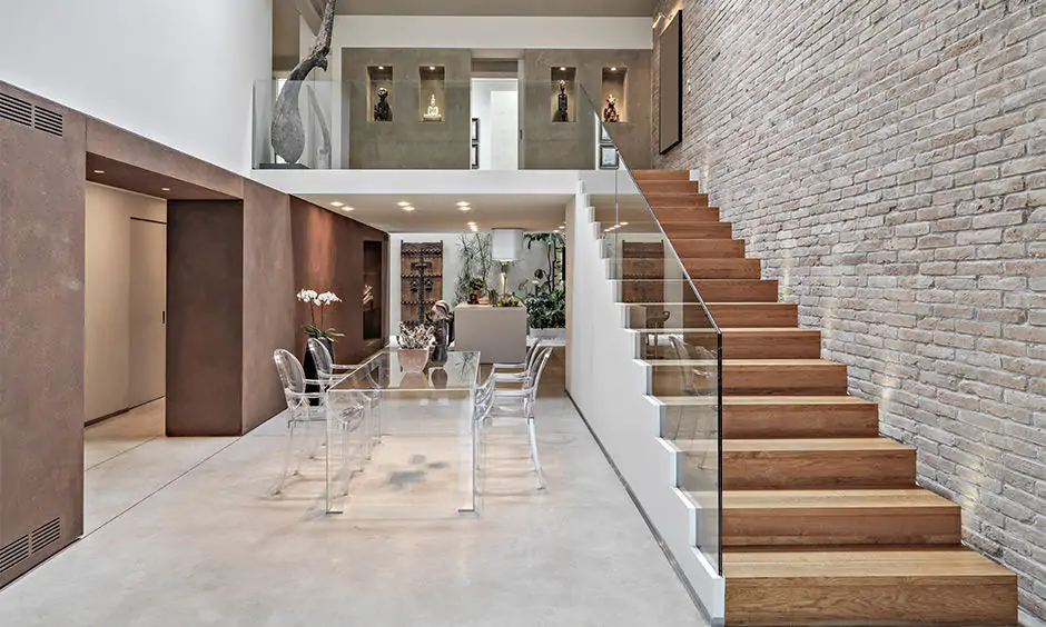 Staircase wall decor with exposed brick wall
