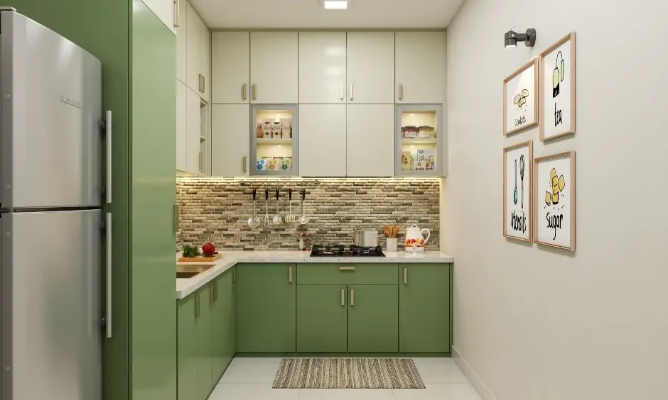 Tiny L-shaped kitchen in green and white, designed to fit snugly into smaller homes