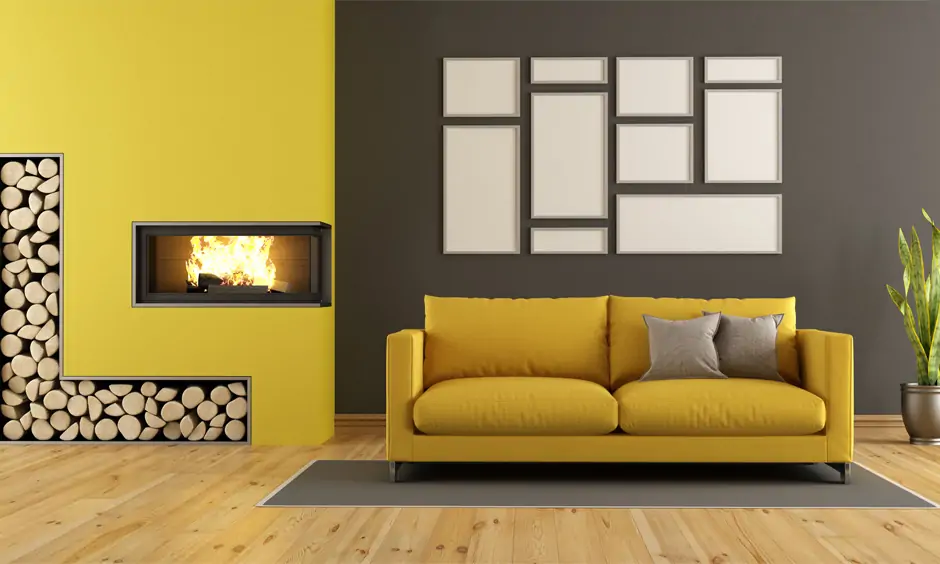 Yellow wall combination colour for black in the living room illuminates the space