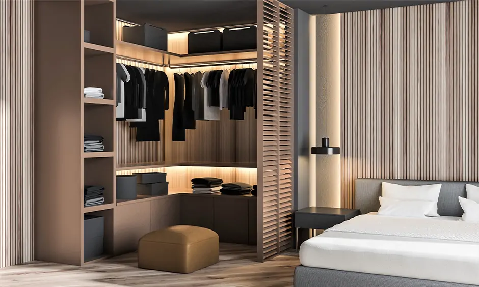 Walk-in closet design for small spaces maximises storage with high shelves