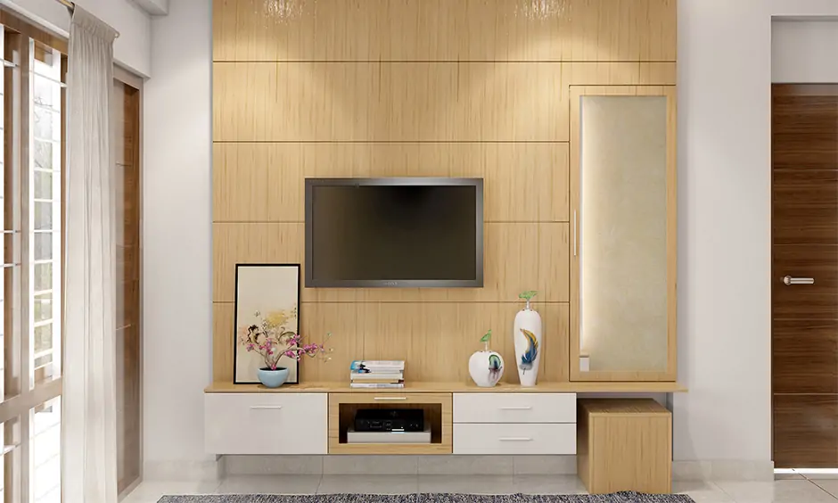 Wooden tiles design for wall blends into the TV unit