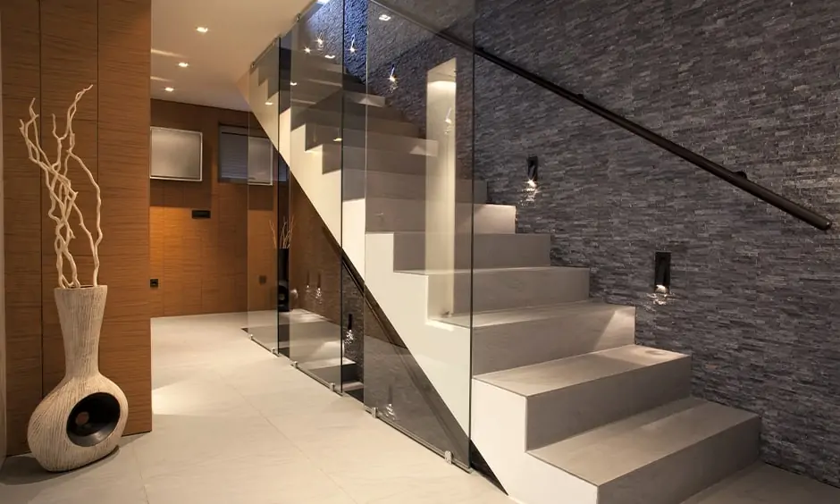 Box-style staircase design with ceiling to floor vertical glass panels