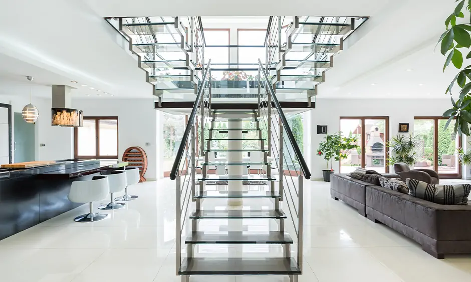 Chic steel staircase design crafted with the interplay of glass