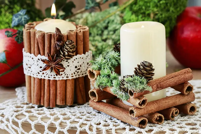 Diy christmas decoration with scented candles for simplistic and graceful look