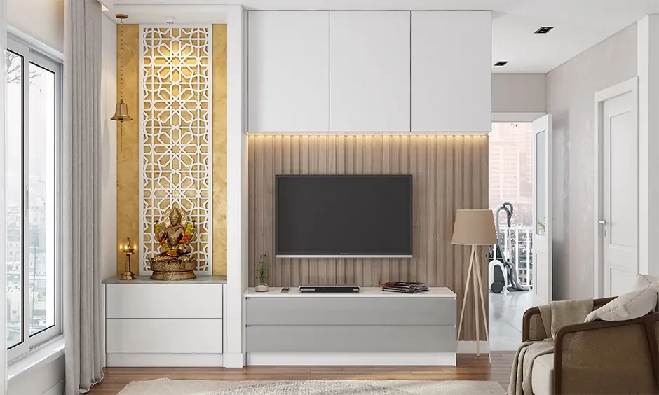 Floor-to-ceiling open mandir with tv unit in white laminate with back panelling