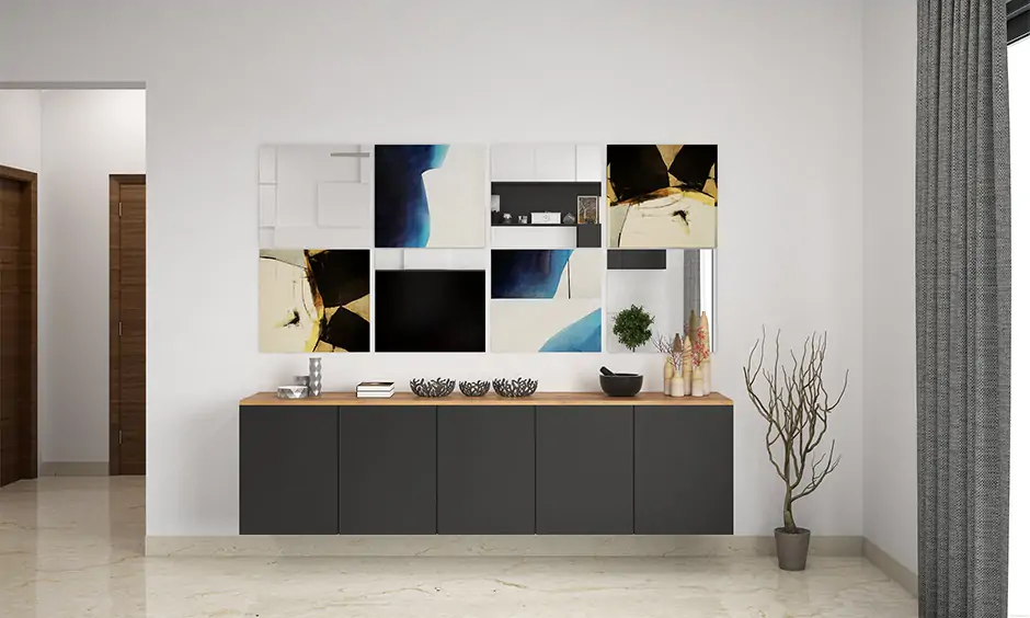 Gallery wall ideas place oversized frames over complementary modular furniture for aesthetics