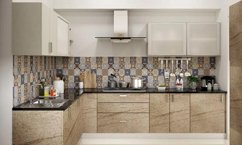 Vitrified tiles used in this kitchen backsplash in moroccan styled are the perfect way to the bright and cheerful kitchen