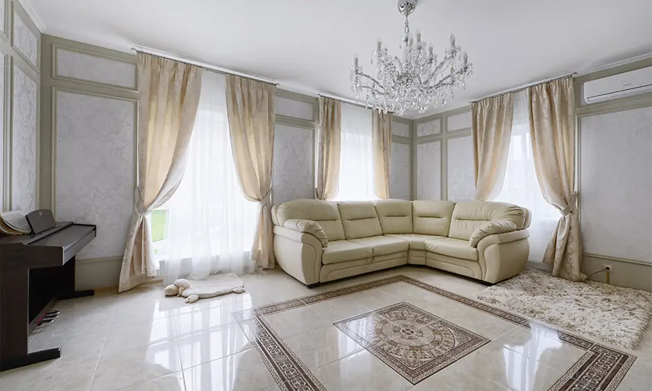 Elegantly designed living room with vitrified tiles offers excellent options in terms of style and patterns