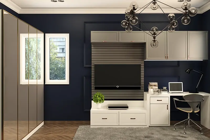 Midnight blue paint colors creates an ultra luxe feel in an ordinary home office with blue wall paint colors