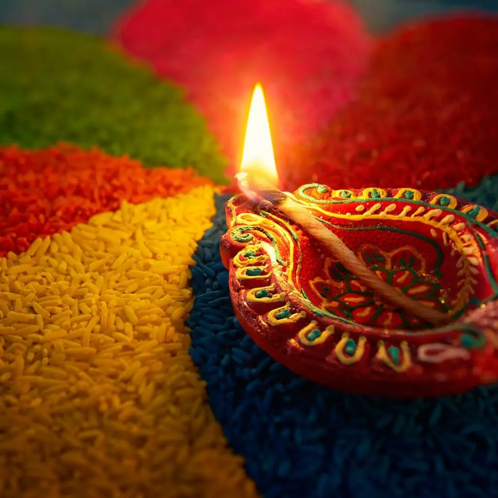 A simple diya decoration ideas is place the diya next to rangoli and enhance the plainest of rangolis into wonderful artwork