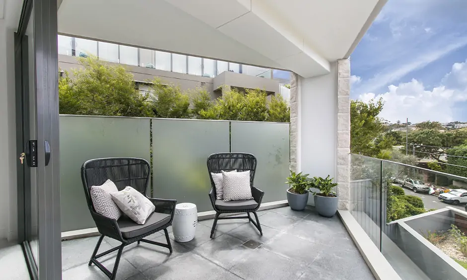 Simple vitrified tiles texture in the balcony are super easy to clean and maintain