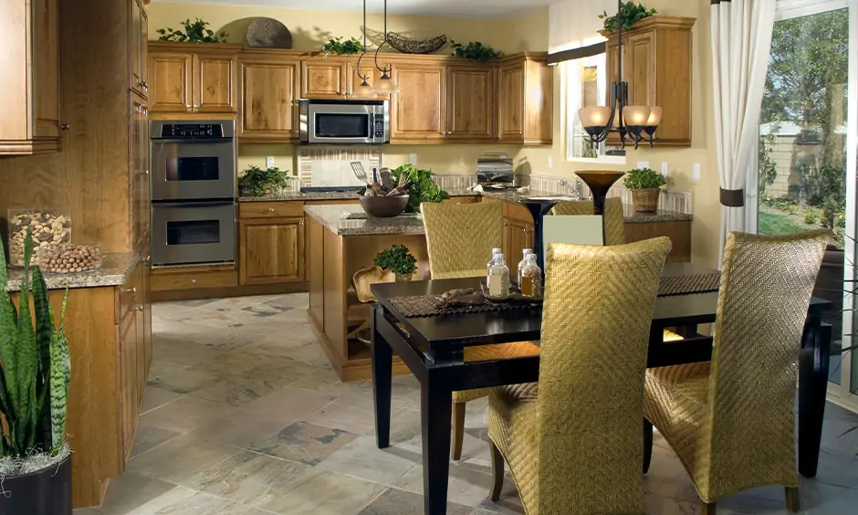 Traditional kitchen with types of vitrified tiles flooring used that brings classic appeal to the area