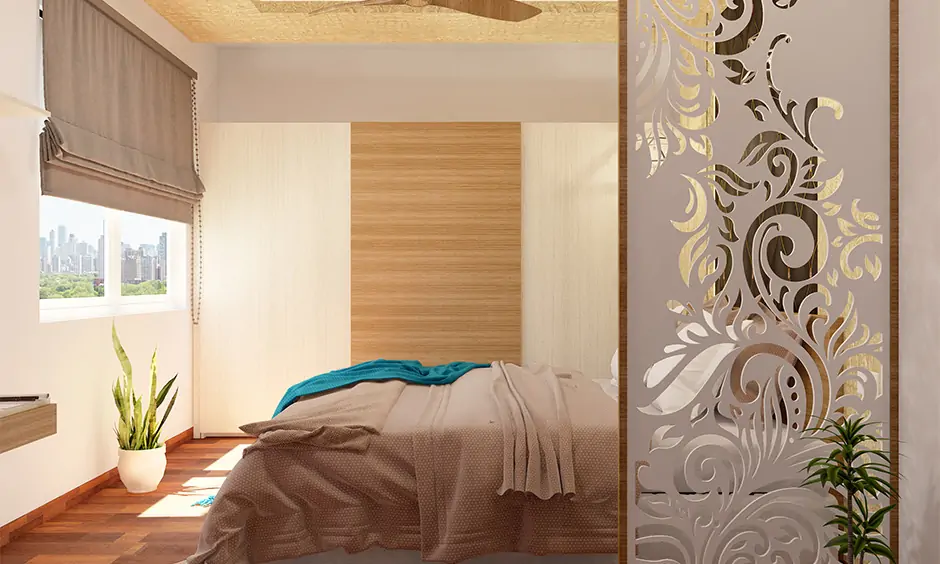 Modern bedroom with jali partition in simple Indian interior design style adds a touch of elegance.